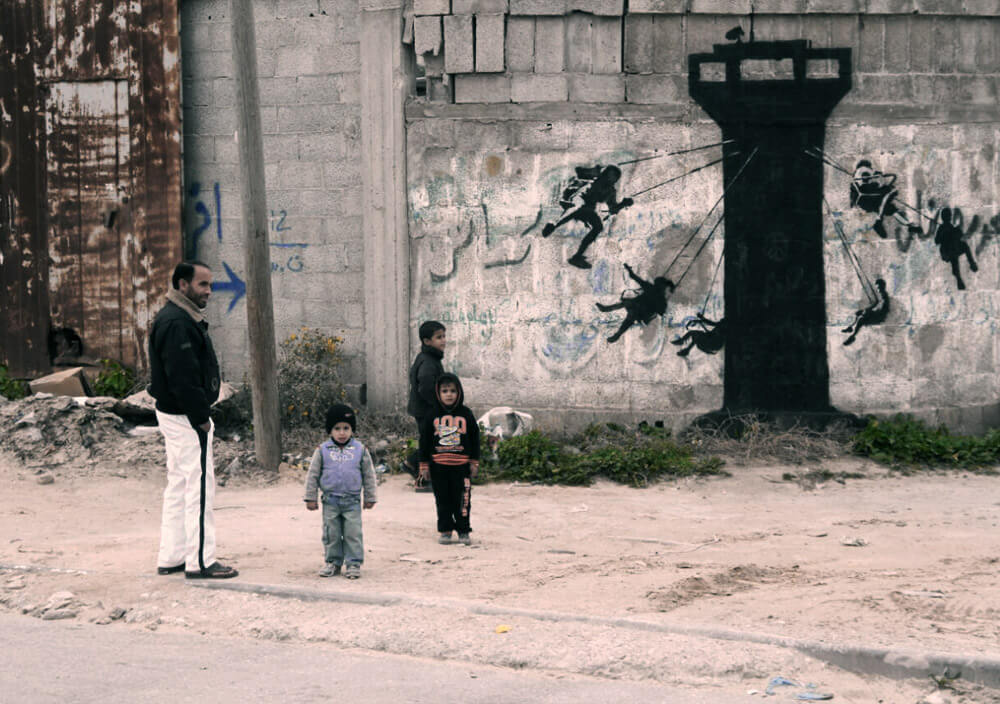Banksy Gaza watchtower fairground mural, Gaza, 2015 — source image for The Walled Off Hotel Box Set