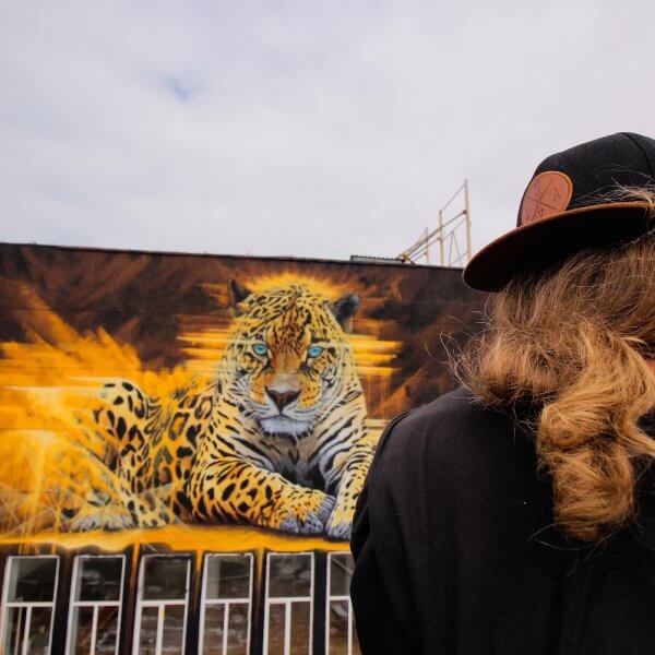 Sonny, To the Bone Street Art Mural, Far Eastern Leopard, Vladivostok Russia 2017. Photo Credit Tess Cunliffe.