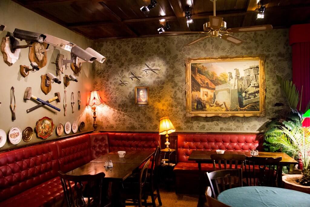 Banksy Walled Off Hotel piano bar interior, Bethlehem, Palestine — photographed by GraffitiStreet, 2017