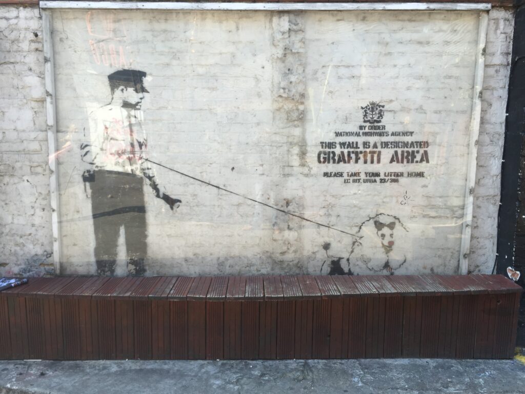 Banksy figurative street art piece, Shoreditch, East London, 2013–2014, photographed by GraffitiStreet