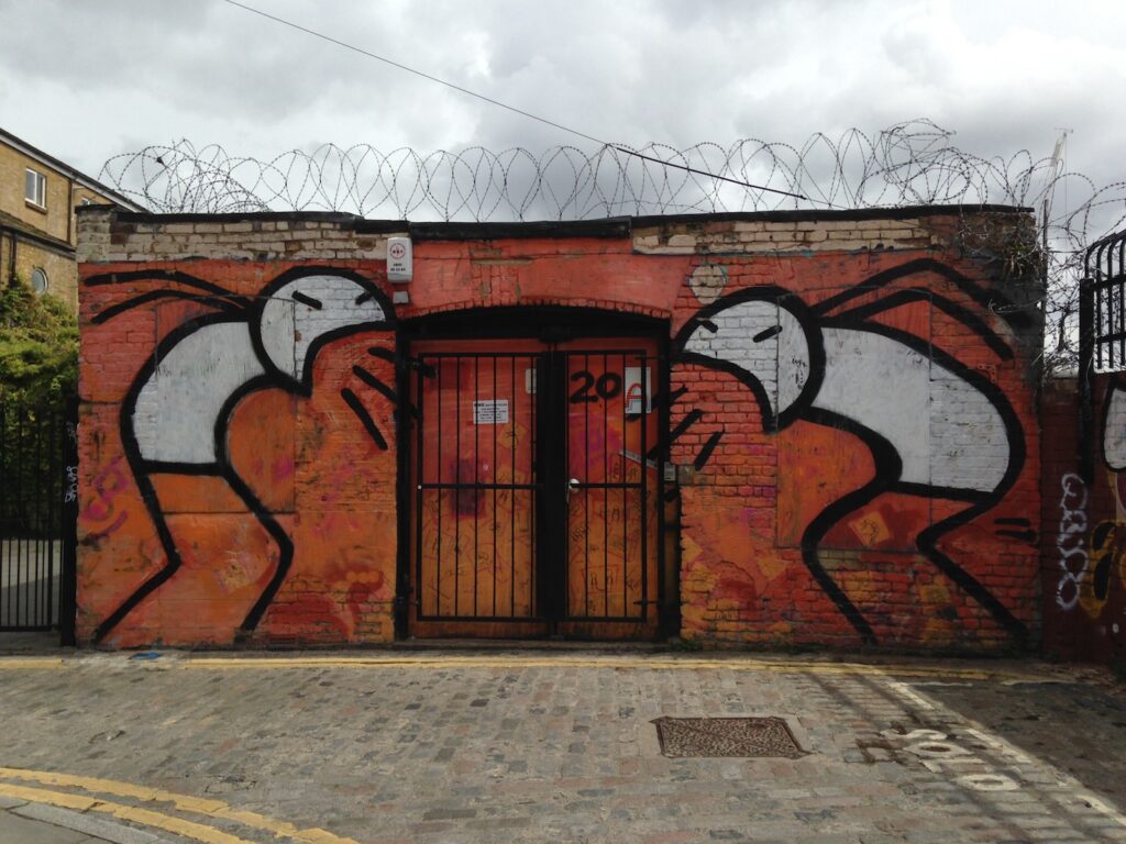 STIK artwork on brick wall, Shoreditch, East London, 2013–2014, photographed by GraffitiStreet