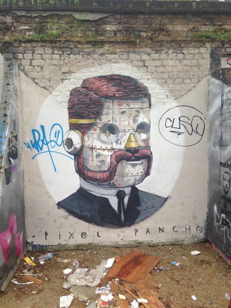 Pixel pancho figurative street art piece, Shoreditch, East London, 2013–2014, photographed by GraffitiStreet