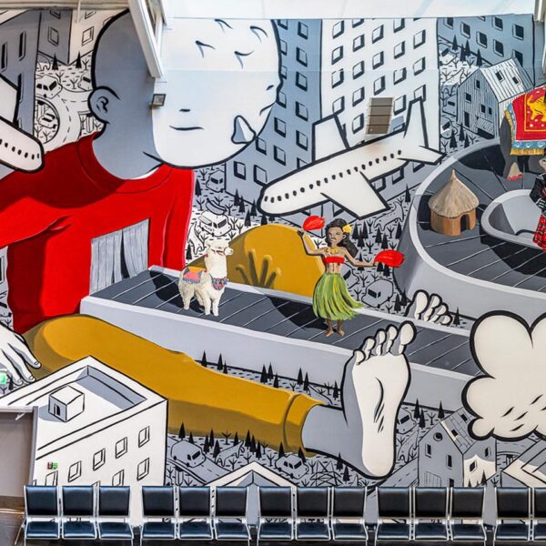 "Baggage Claim" Mural by Millo at Stavanger Airport: A Beautiful Representation of Travel and Unity. Image © Brian Tallman