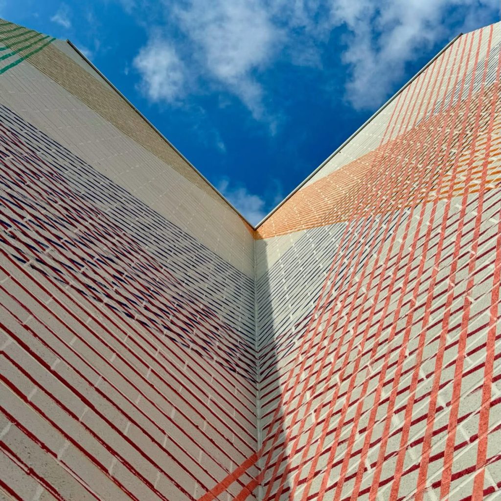 Geometric public mural Intertwined Perspectives by Cyndie Belhumeur